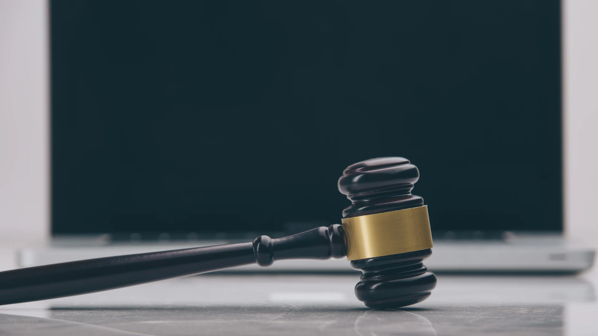 Judge’s gavel symbolizing governance in website redesign